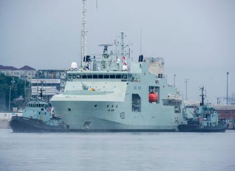 HMCS Harry deWolf heads from the Irving-owned Halifax shipyard on its way to being delivered to the Royal Canadian Navy dockyard in Halifax on July 31, 2020. (The Canadian Press/Andrew Vaughan)