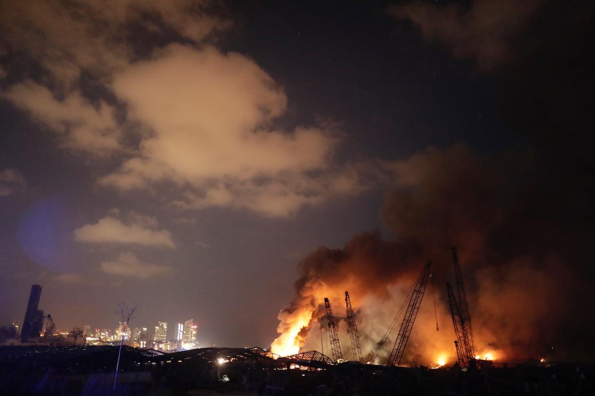 Smoke rises from a massive explosion in Beirut, Lebanon, on Aug. 4, 2020. (Hassan Ammar/AP Photo)