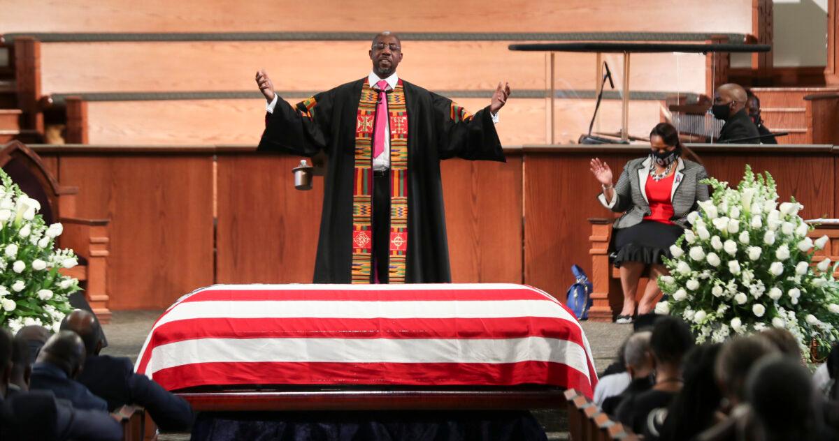 Rev. Raphael Warnock offers a benediction to close the funeral service of the late Rep. John Lewis (D-Ga.) at Ebenezer Baptist Church in Atlanta, Ga., on July 30, 2020. (Alyssa Pointer/Pool/Getty Images)