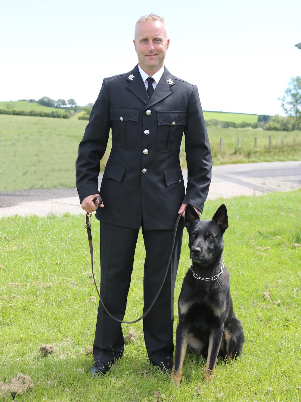 Police Constable Peter Lloyd pictured with his K-9, PD Max (<a href="https://www.dyfed-powys.police.uk/en/newsroom/press-releases/missing-mum-and-baby-found-after-night-outdoors-thanks-to-police-dog-on-his-first-shift/">Dyfed-Powys Police</a>)