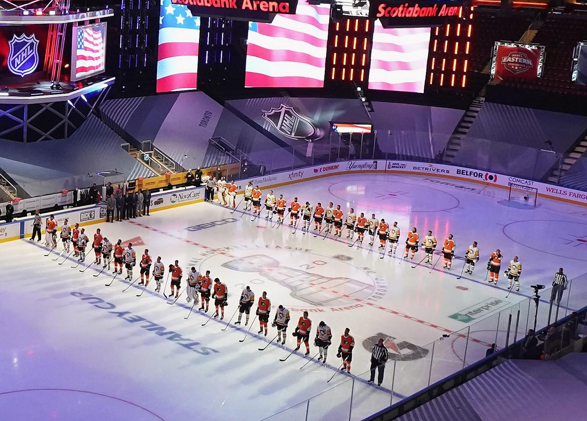 A view of the arena during the national anthems prior to an exhibition game between the Pittsburgh Penguins and the Philadelphia Flyers at Scotiabank Arena on July 28, 2020, in Toronto, Canada. (Andre Ringuette/Freestyle Photo/Getty Images)