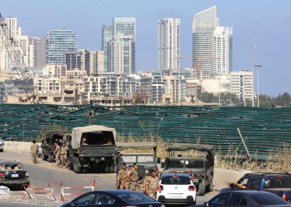 Lebanese soldiers are seen near the site of Tuesday's blast in Beirut's port area, Lebanon on Aug. 7, 2020. (Aziz Taher/Reuters)