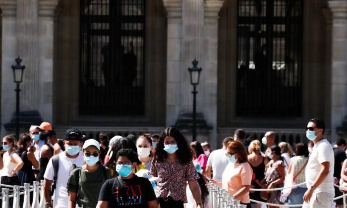 Paris Orders Mandatory Wearing of Masks Outdoors in Busy Areas as Virus Flares Up