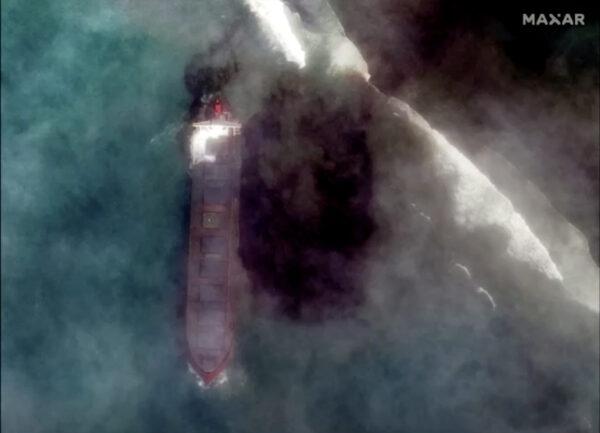 In this satellite image provided by 2020 Maxar Technologies on Aug. 7, 2020, an aerial view of the MV Wakashio, a bulk carrier ship that recently ran aground off the southeast coast of Mauritius. (2020 Maxar Technologies via Reuters)