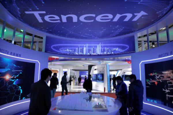 People visit Tencent's booth at the World 5G Exhibition in Beijing, China, on Nov. 22, 2019. (Jason Lee/File Photo/Reuters)