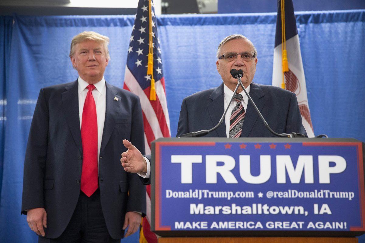 Then sheriff Joe Arpaio (R) of Maricopa County, Arizona, endorses then-presidential candidate Donald Trump prior to a rally in Marshalltown, Iowa, on Jan. 26, 2016. (Photo by Scott Olson/Getty Images)