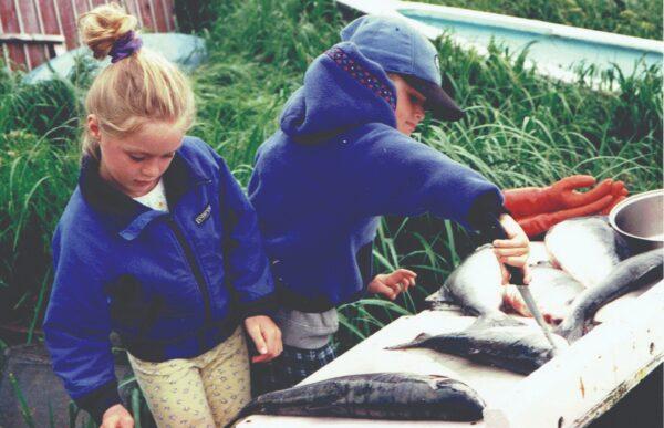 Emma and Claire learned to prepare and cook fish from a young age. (Courtesy of Emma Teal Laukitis and Claire Neaton)