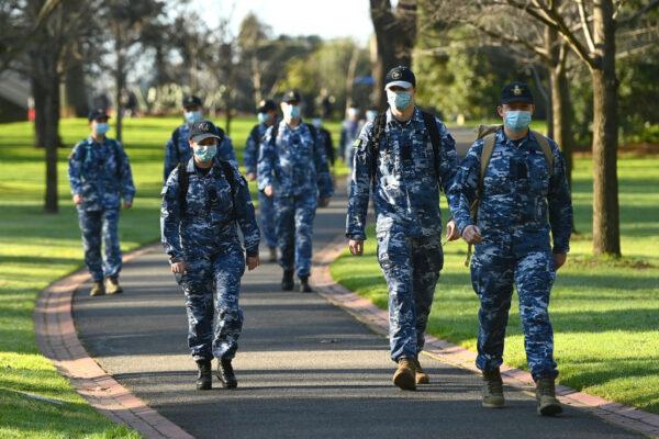Members of the Australian Defence Force walk through Fitzroy Gardens in Melbourne as the city is under stage 4 lockdown restrictions, on Aug. 10, 2020. ( Quinn Rooney/Getty Images)