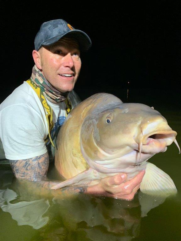 Davidson with his 101-pound carp at Euro Aqua fishing club in Nemesvita, Hungary, in September 2019. (Courtesy of Martin Davidson)