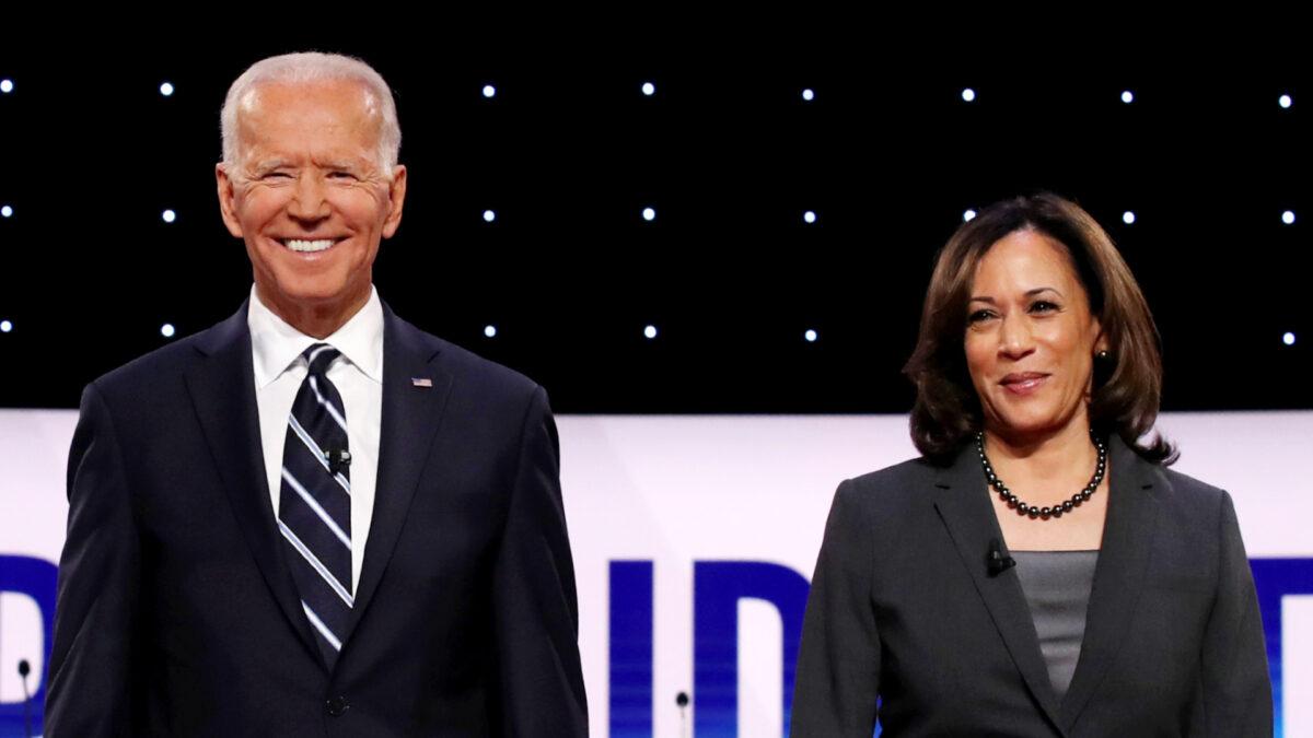 Former Vice President Joe Biden (L) and Sen. Kamala Harris (D-Calif.) take the stage at the Democratic Presidential Debate at the Fox Theatre in Detroit, Mich., on July 31, 2019. (Justin Sullivan/Getty Images)