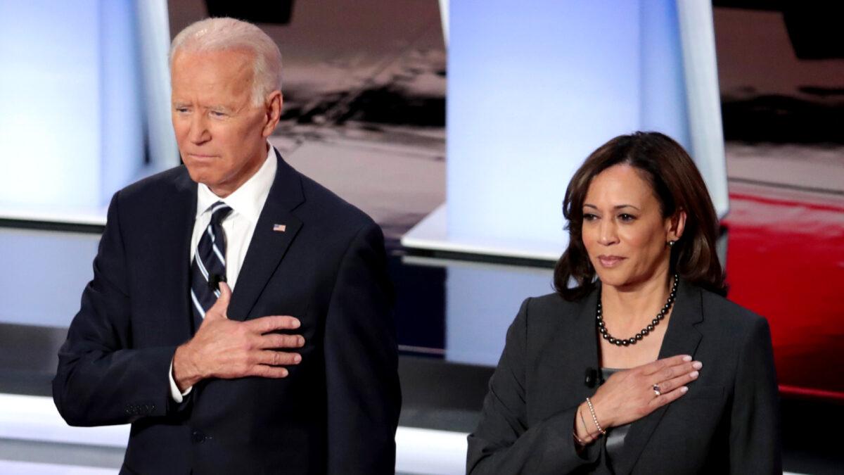 Democratic presidential candidates former Vice President Joe Biden (L) and Sen. Kamala Harris (D-Calif.) take the stage at the Democratic Presidential Debate at the Fox Theatre in Detroit, Mich., on July 31, 2019. (Scott Olson/Getty Images)