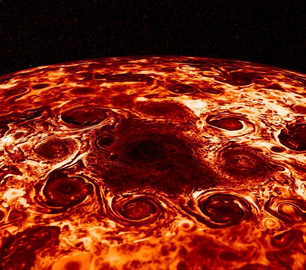 This composite image, derived from data collected by the Jovian Infrared Auroral Mapper (JIRAM) instrument aboard NASA’s Juno mission to Jupiter, shows the central cyclone at the planet’s North Pole and the eight cyclones that encircle it. (Courtesy of <a href="https://www.nasa.gov/feature/jpl/nasa-juno-findings-jupiter-s-jet-streams-are-unearthly">NASA/JPL-Caltech/SwRI/ASI/INAF/JIRAM</a>)