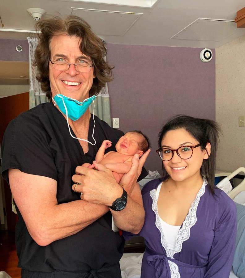 Dr. Bryan Cox with Lauren Cortez and baby Logan. (Courtesy of Jorge Luna and Peter Cortez)