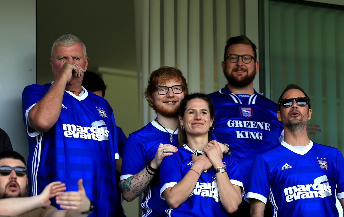 Singer-songwriter Ed Sheeran and his wife, Cherry Seaborn, during the Sky Bet Championship match between Ipswich Town and Aston Villa at Portman Road in Ipswich, England, on April 21, 2018. (Stephen Pond/Getty Images)