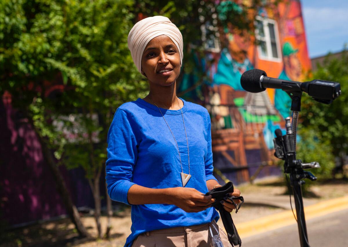  Rep. Ilhan Omar (D-Minn.) speaks with media gathered outside Mercado Central in Minneapolis, Minn on Aug. 11, 2020. (Stephen Maturen/Getty Images)