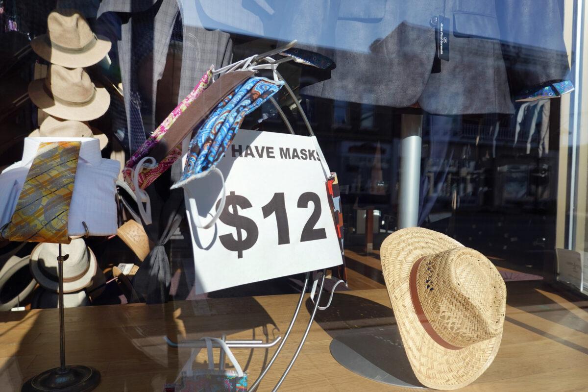 Masks are displayed in a store window in Elkhorn, Wis., on May 15, 2020. (Scott Olson/Getty Images)