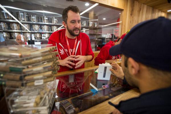 A customer buys cannabis products at a store in West Hollywood, Calif., on Jan. 2, 2018. (David McNew/Getty Images)