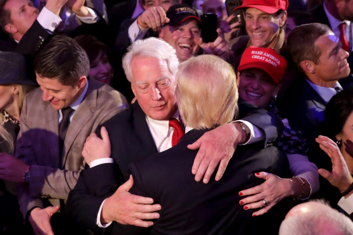 Republican president-elect Donald Trump (R) hugs his brother Robert Trump after delivering his acceptance speech at the New York Hilton Midtown in New York City in the early morning hours of Nov. 9, 2016. (Chip Somodevilla/Getty Images)