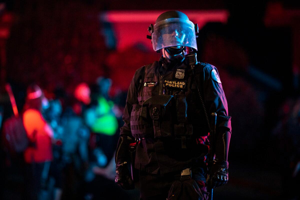Police are seen in riot gear in Portland, Ore., on Aug. 15, 2020. (Paula Bronstein/Getty Images)