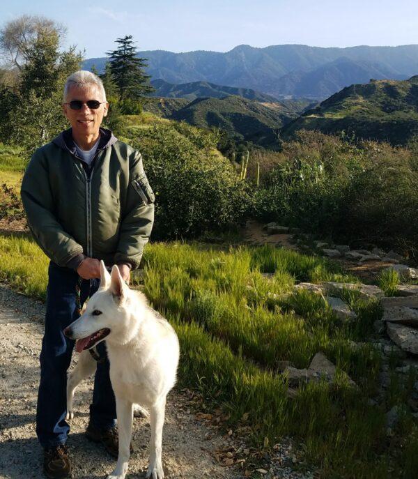 Jeff Elser stands with his dog, Timber, a Husky-German Shepherd mix. (Courtesy of Jeff Elser)