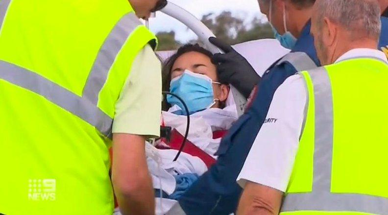 Mark Rapley repeatedly punched a great white shark to save his wife, Chantelle Doyle, who was being attacked by the animal in New South Wales. (Courtesy of 9News Australia)
