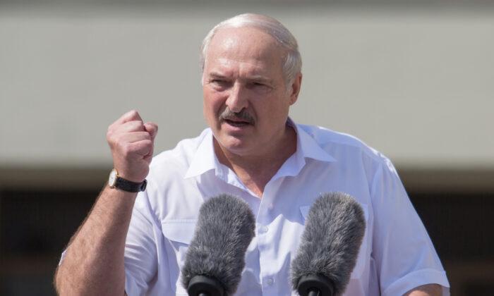 Lukashenko Says He Is Ready to Share Power in Belarus As Protests Mount