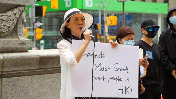 Chinese-Canadian democracy activist and author Sheng Xue speaks at the rally in Toronto on Aug. 16, 2020. (NTD Television)