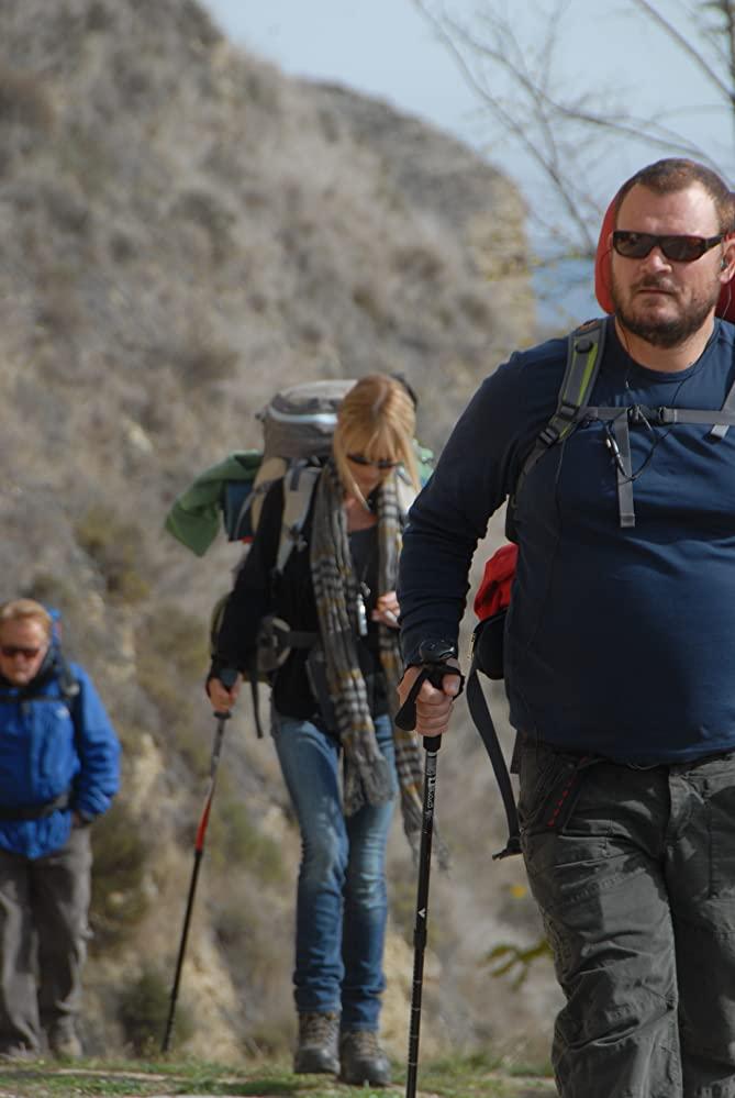 (L–R) Tom (Martin Sheen), Sarah (Deborah Kara Unger), and Joost (Yorick van Wageningen) hiking hard, in a scene from "The Way." (Arc Entertainment)