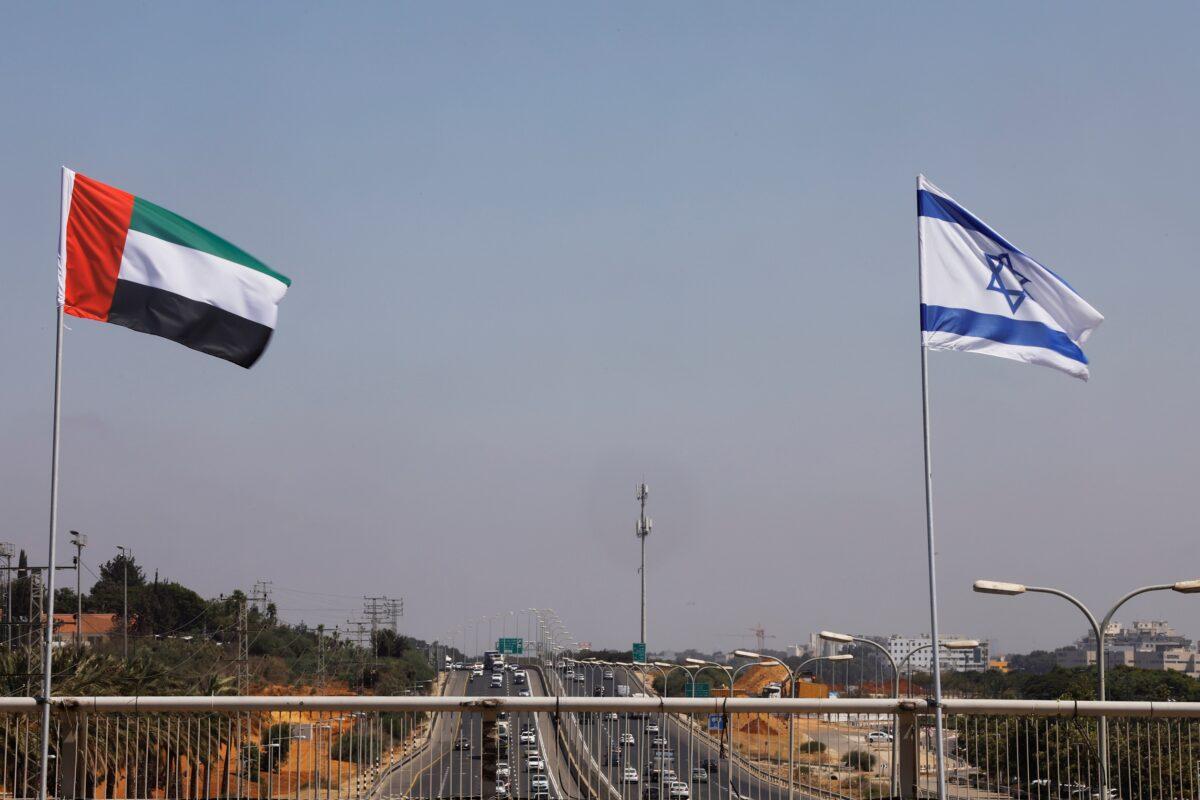 The national flags of Israel and the United Arab Emirates flutter along a highway following the agreement to formalize ties between the two countries, in Netanya, Israel, on Aug. 17, 2020. (Nir Elias/Reuters)