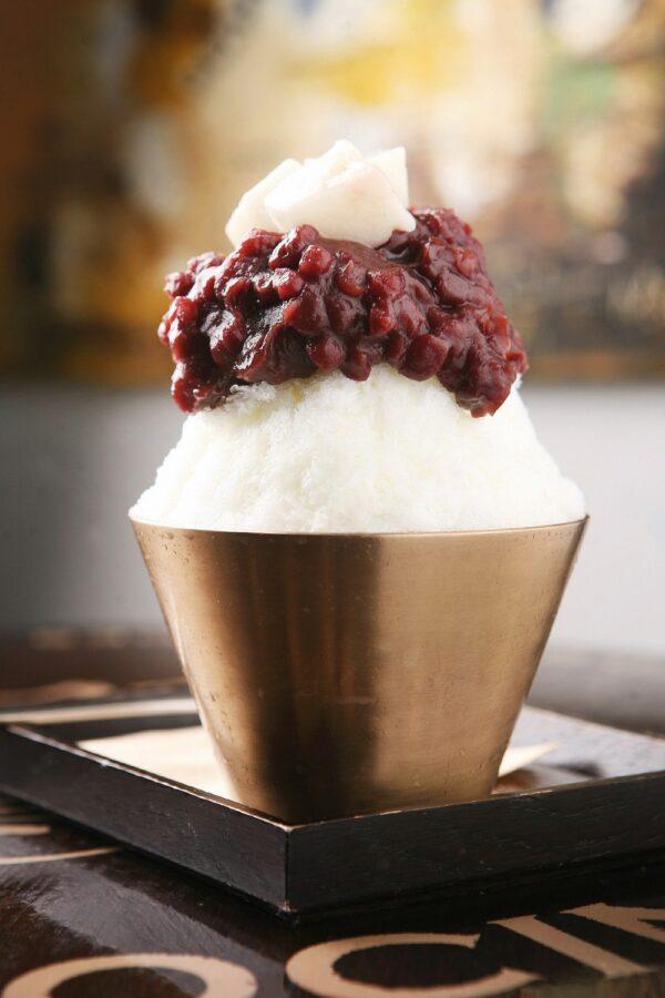 Korean bingsu started as a simple treat of shaved iced with red bean porridge. (TMON/Shutterstock)