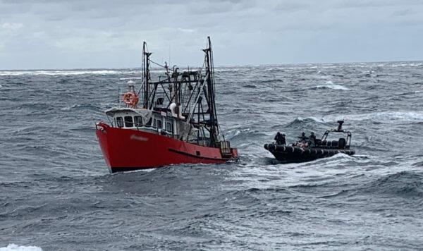 Law enforcement authorities board The Coralynne off the coast of Newcastle, Australia on Aug. 15, 2020. (Australian Federal Police)