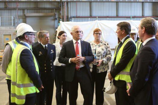 Former Australian Prime Minister Malcolm Turnbull (C), Chief of Navy, Vice Admiral Tim Barrett (2nd L) and Minister for Defence Marise Payne (3rd R) take a tour of the ASC naval shipyards in Adelaide. (James Knowler/AFP via Getty Images)
