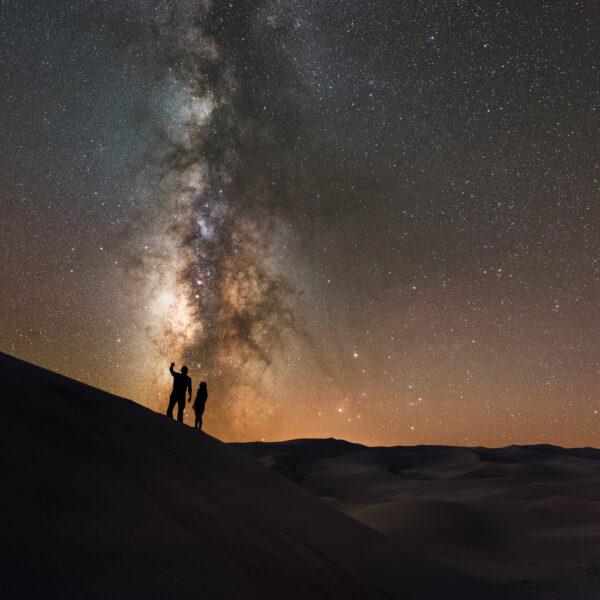 People may experience transcendence—feeling awed by something greater than themselves—in different ways, such as stargazing. (Mike Ver Sprill/Shutterstock)