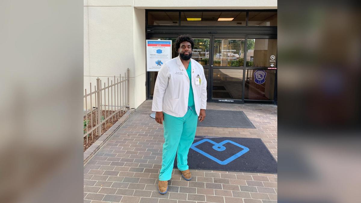 Russell Ledet, a medical student at Tulane University, stands outside Baton Rouge General Medical Center, where he formerly worked as a security guard. (Courtesy of Russell Ledet)