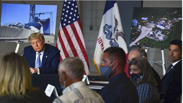 President Donald Trump participates in an Iowa Disaster Recovery Briefing at the Eastern Iowa Airport in Cedar Rapids, Iowa, on Aug. 18, 2020. (Brendan Smialowski/AFP via Getty Images)