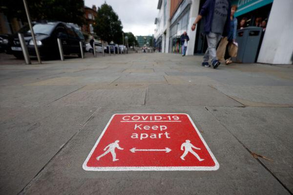 Social distancing signs are seen in Blackburn town centre, England, on July 17, 2020, amid the CCP virus pandemic. (Christopher Furlong/Getty Images)