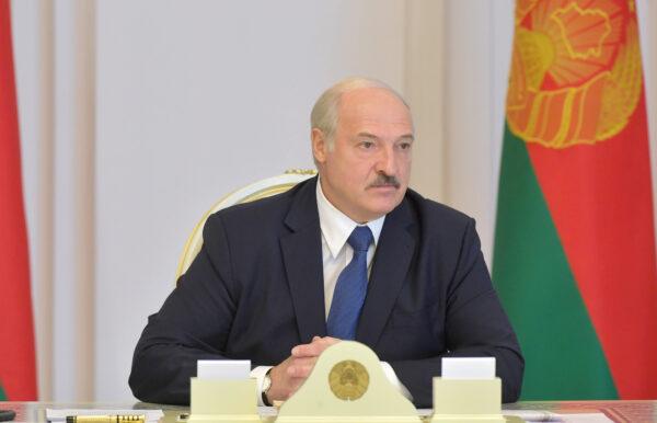 Belarusian President Alexander Lukashenko chairs a meeting with members of the Security Council in Minsk, Belarus, on Aug. 18, 2020. (Andrei Stasevich/BelTA/Handout via Reuters)