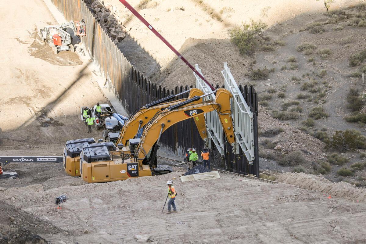 Construction continues up Mount Cristo Rey on a half-mile section of border fence built by We Build the Wall at Sunland Park, N.M., on May 30, 2019. (Charlotte Cuthbertson/The Epoch Times)