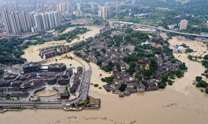 Chinese Officials Warn That Worst Yet to Come as Flooding Reaches New Record