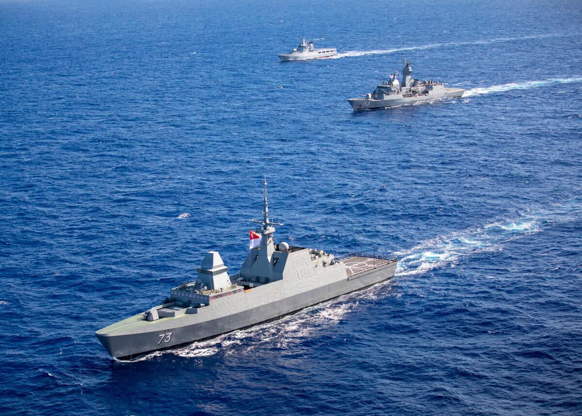 Her Majesty’s Australian Ship Stuart sails in company with the Republic of Singapore Ship Supreme and Kapal Diraja Brunei (Royal Brunei Ship) Daruleshan through the Pacific Ocean as they prepare to take part in Exercise Rim of the Pacific 2020 on Aug. 17, 2020 (Australian Department of Defense)
