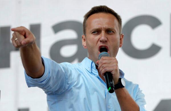 Russian opposition activist Alexei Navalny gestures while speaking to a crowd during a political protest in Moscow, Russia, on July 20, 2019. (Pavel Golovkin/AP Photo)