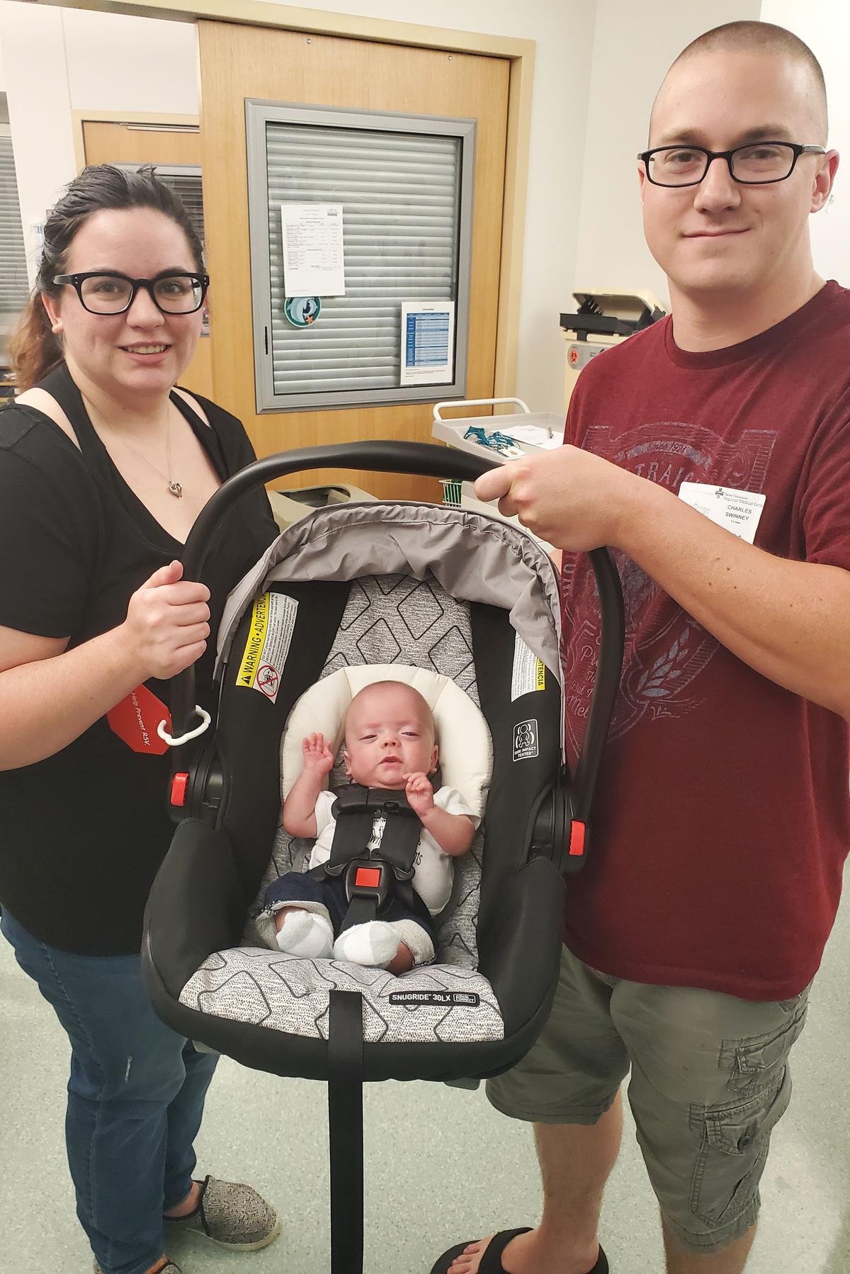 Crystal and Cody Swinney take CJ home for the first time (Caters News)