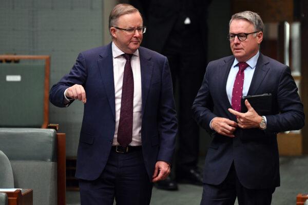 Leader of the Opposition Anthony Albanese (left) arrives with Opposition Minister for Agriculture Joel Fitzgibbon during the opening of the House of Representatives at Parliament House in Canberra, Australia, on June 18, 2020. (Sam Mooy/Getty Images)