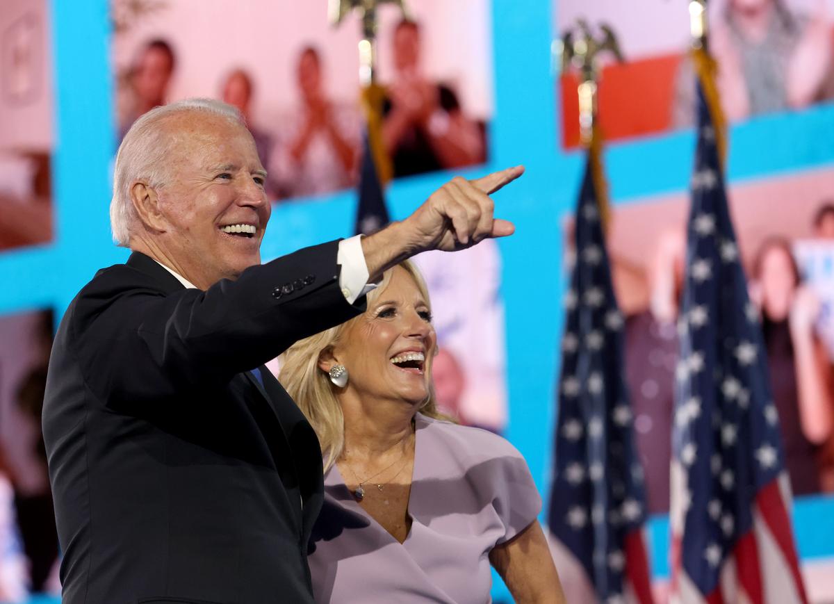 Democratic presidential nominee Joe Biden and his wife, Jill Biden, interact with supporters via video teleconference after Biden delivered his acceptance speech on the fourth night of the Democratic National Convention from the Chase Center in Wilmington, Delaware, on Aug. 20, 2020. (Win McNamee/Getty Images)