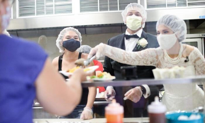 Newlyweds Donate and Serve Canceled Wedding Reception Food to a Local Women’s Shelter