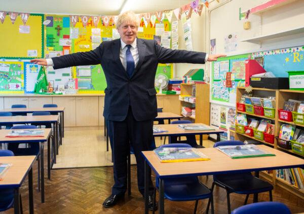 Prime Minister Boris Johnson visits St Joseph's Catholic Primary School in Upminster, east London, on Aug. 10, 2020. (Lucy Young/pool/AFP via Getty Images)