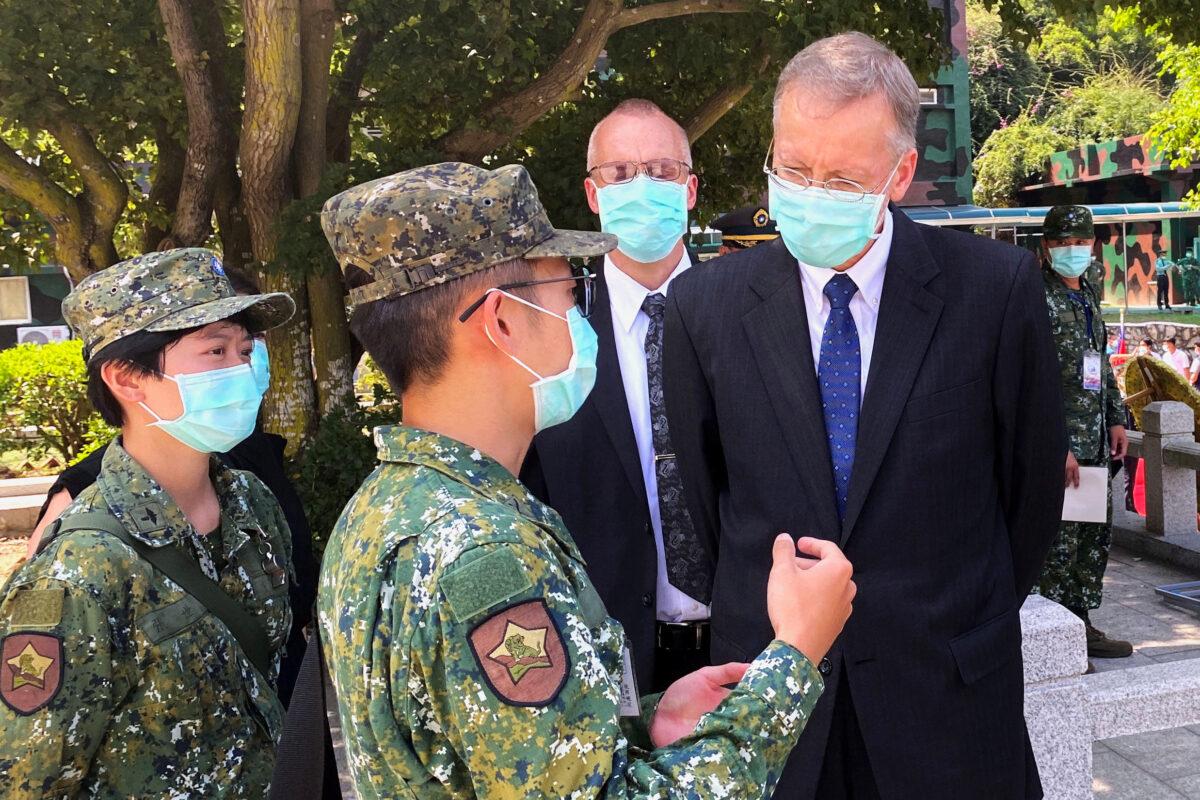 Brent Christensen, director of the American Institute in Taiwan talks to soldiers after attending an event to mark the 62nd anniversary of the Second Taiwan Strait crisis in Kinmen, Taiwan, on Aug. 23, 2020. (Ben Blanchard/Reuters)