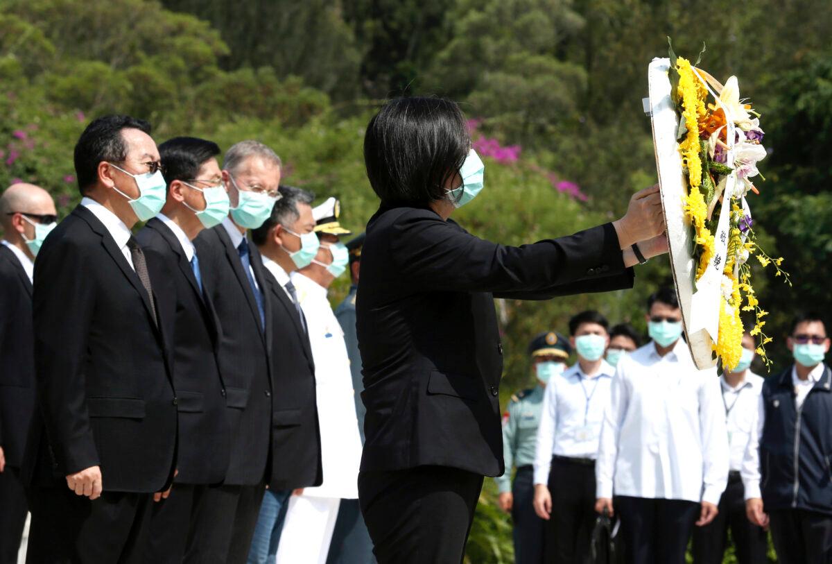 Taiwan President Tsai Ing-wen (R) and Director of the American Institute in Taiwan (AIT) William Brent Christensen, third from left, attend a memorial service held for Taiwanese soldiers killed there fighting Mainland China on Aug. 23, 1958, in Kinmen, Taiwan, on Aug. 23, 2020. (Chiang Ying-ying/AP Photo)