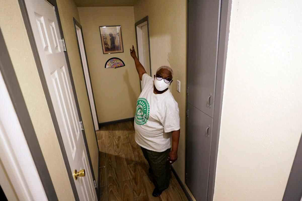 Doris Brown talks about the repairs made from the flood damage to her home in Houston, Texas, on July 31, 2020. (David J. Phillip/AP Photo)
