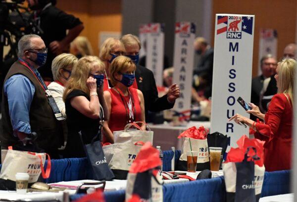 The Missouri delegation readies for a photo on the first day of the Republican National Convention in Charlotte, N.C., on Aug. 24, 2020. (David T. Foster III-Pool/Getty Images)